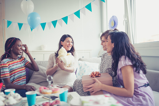 Four girlfriends on baby shower party