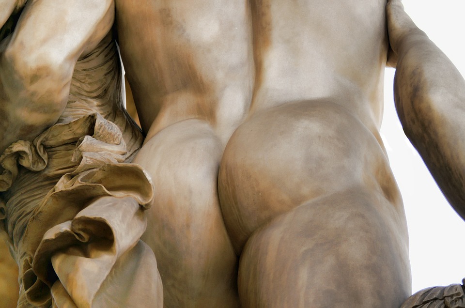 a statue Art of a man showing his butt